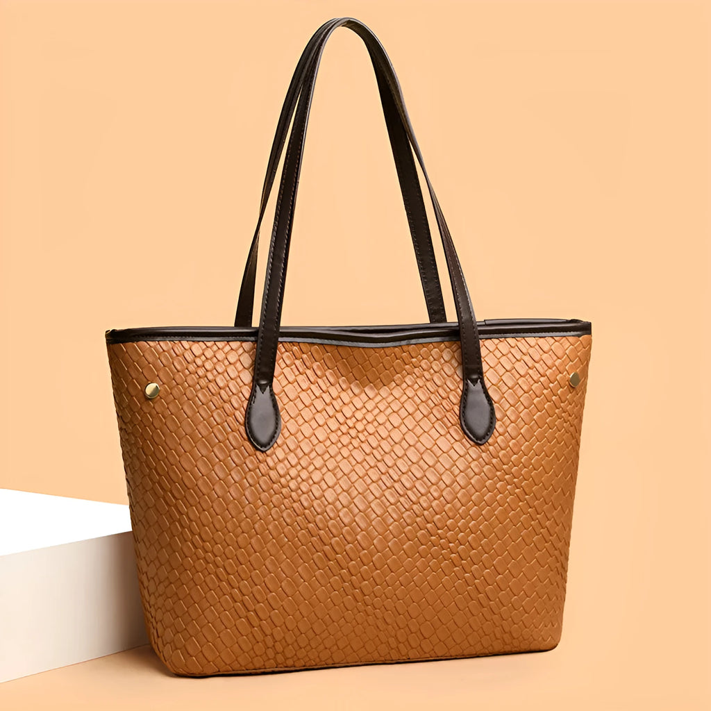 Retro women's large capacity black PU leather handbag with exterior pocket and horizontal square shape.