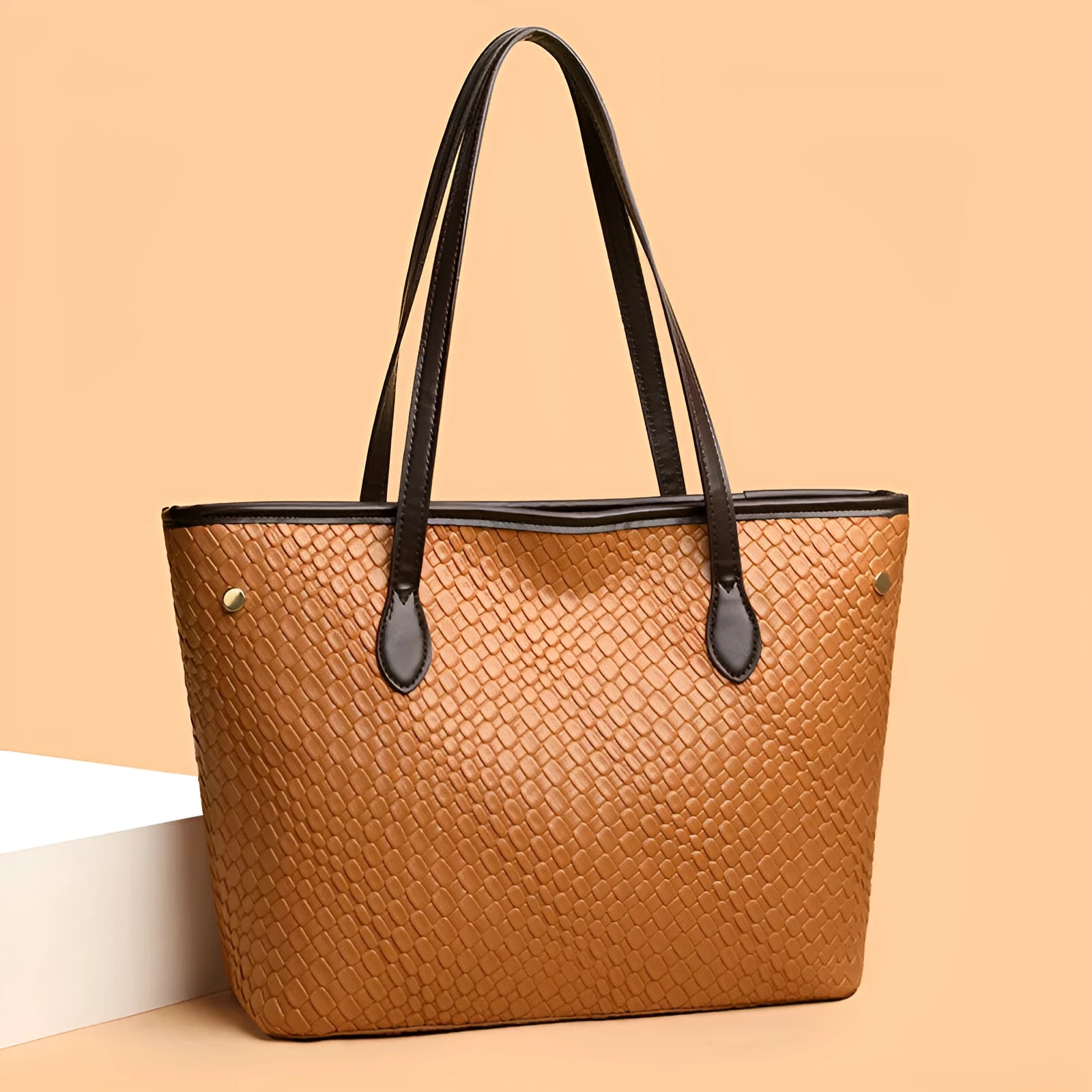 Retro women's large capacity black PU leather handbag with exterior pocket and horizontal square shape.