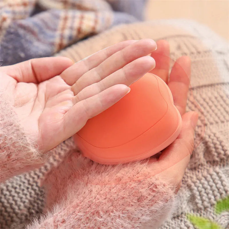 Mini electric hand warmer in cat paw shape, USB rechargeable, in white colour option, palm-sized