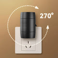 Small white plug-in night lamp with a rotatable head and adjustable brightness control on a grey background.