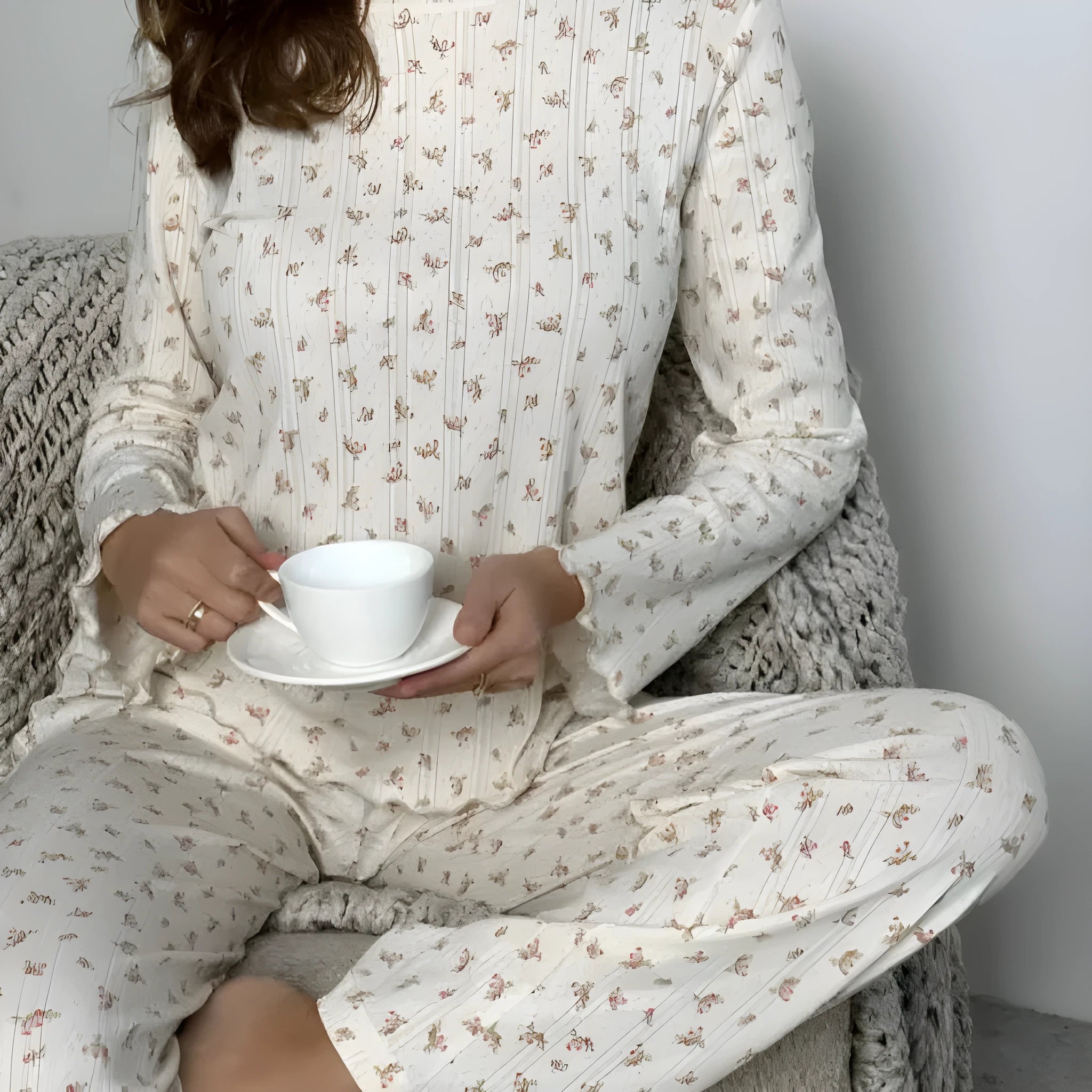 Women's white floral print lounge suit with bell sleeve top and wide-leg trousers