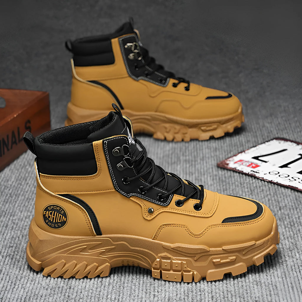 Men's black and yellow high-top Martin boots with a mid heel on an injection moulded sole.