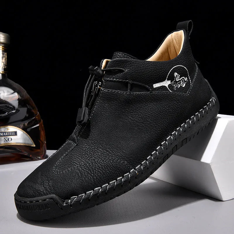 Men's black casual leather shoes with a mid heel and round toe on a rubber sole