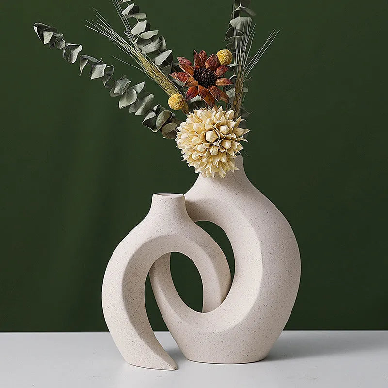 Two glazed ceramic vases in snuggle colour set for home decoration