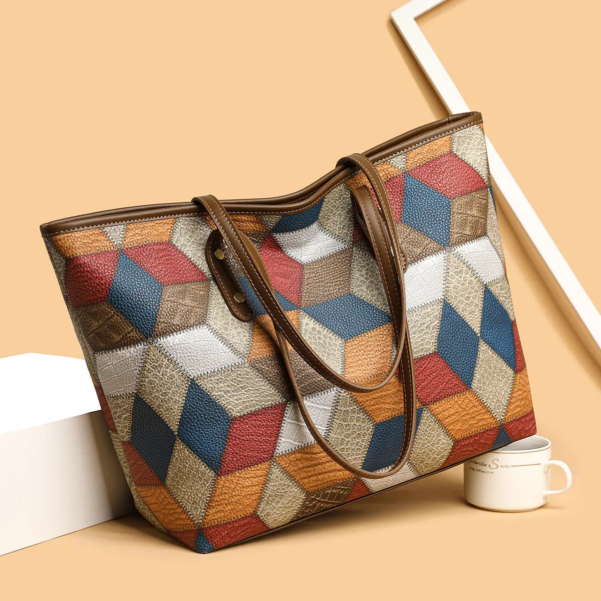 Women's large capacity PVC handbag in blue brown colour with outer sandwich pocket organisation