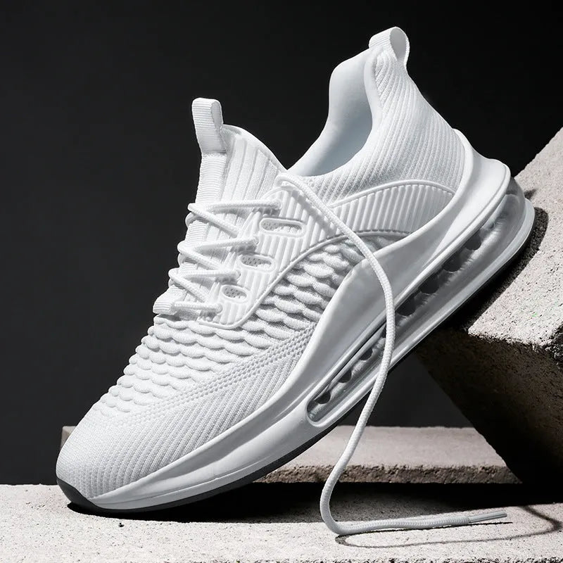 Men's black mesh running shoes with low top, round toe, and lace-up design on rubber sole