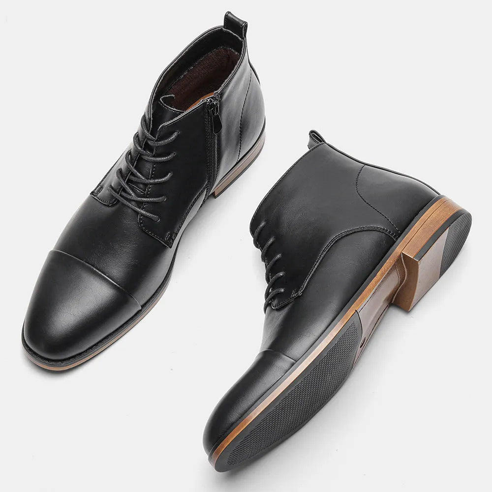 Men's brown plus size Chelsea boot with side zipper, round toe, and low heel.