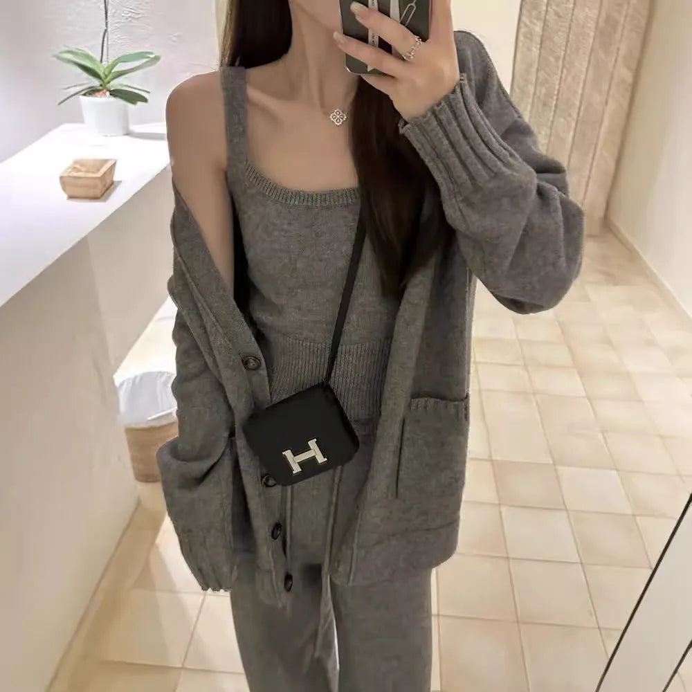 Women's light brown knit cardigan vest and suspender pants three-piece set laid flat