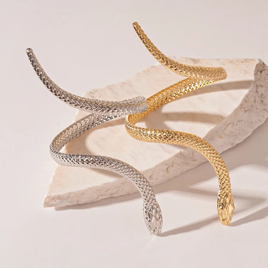Gold and silver simulated snakes bracelet and ring set with twisted winding design