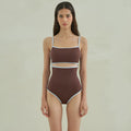 Brown nylon triangle one-piece swimsuit for women on a hanger