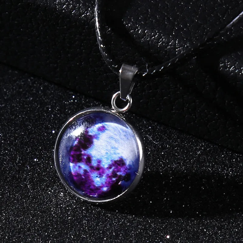 Luminous alloy pendant necklace with constellation design in coloured glass, showing extension chain
