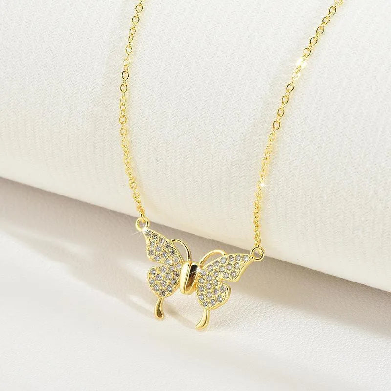 Gold titanium steel clavicle chain necklace with magnetic butterfly pendant on twisted chain