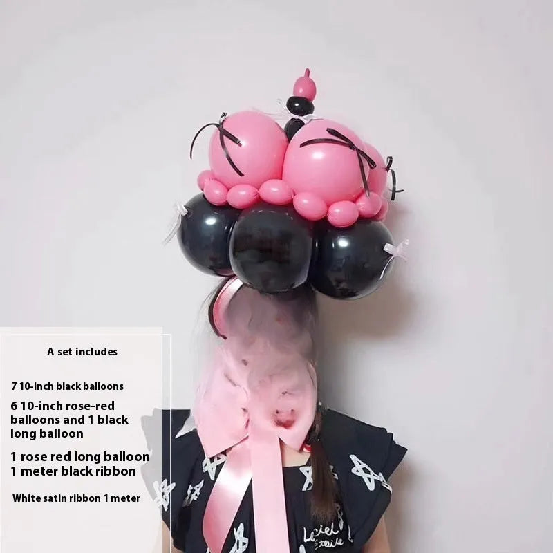 DIY balloon bouquet cake decoration kit with assorted balloons for creating a round cake topper.