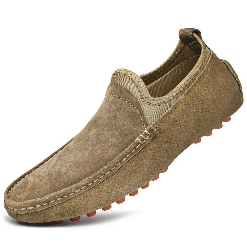 Unisex slip-on casual shoes in first layer cowhide with sewn rubber sole, shown in grey, khaki, brown and black