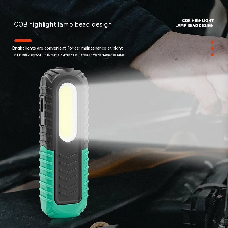 Black and green USB-rechargeable auto repair work light with compact ABS plastic body