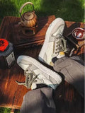 Green casual sneakers with star pattern and round toe design