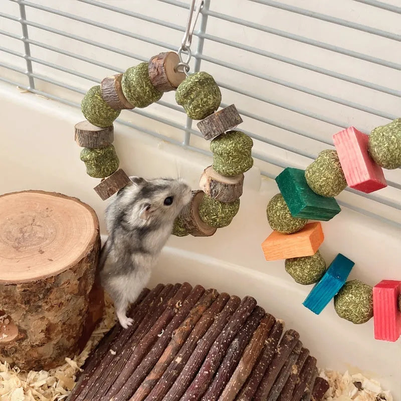 Hamster chew toy with Totoro decorative ring, straw ball, and applewood molar rod