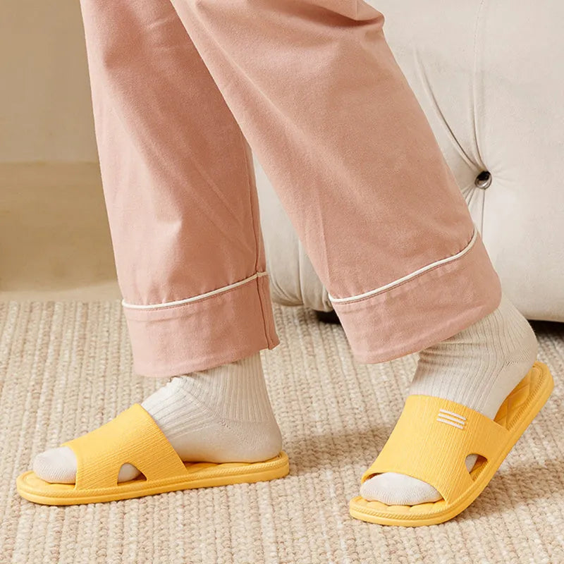 Anti-slip lozenge texture PVC home slippers in solid colours for indoor summer wear