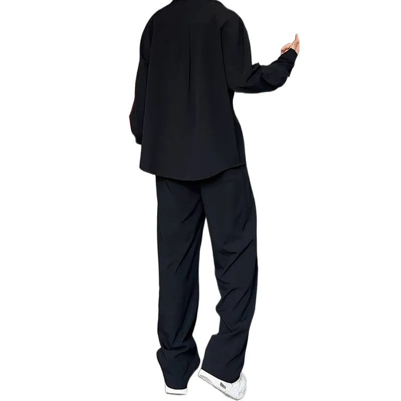 Men's black casual two-piece suit with long sleeve polo shirt and matching trousers slim fit