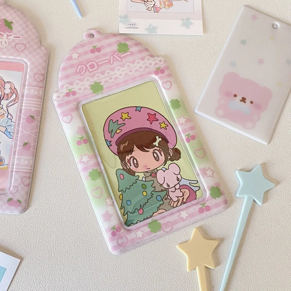 Cartoon PVC meal card holder pendant on a chain, showing strawberry and four-leaf clover design options.
