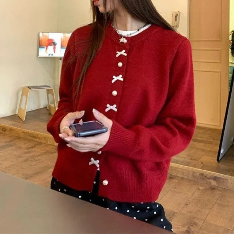 Women's pink cardigan with bow pearl buttons, regular sleeves, medium thickness