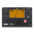 TM-60 black and white electronic metronome and tuner with digital display showing BPM.