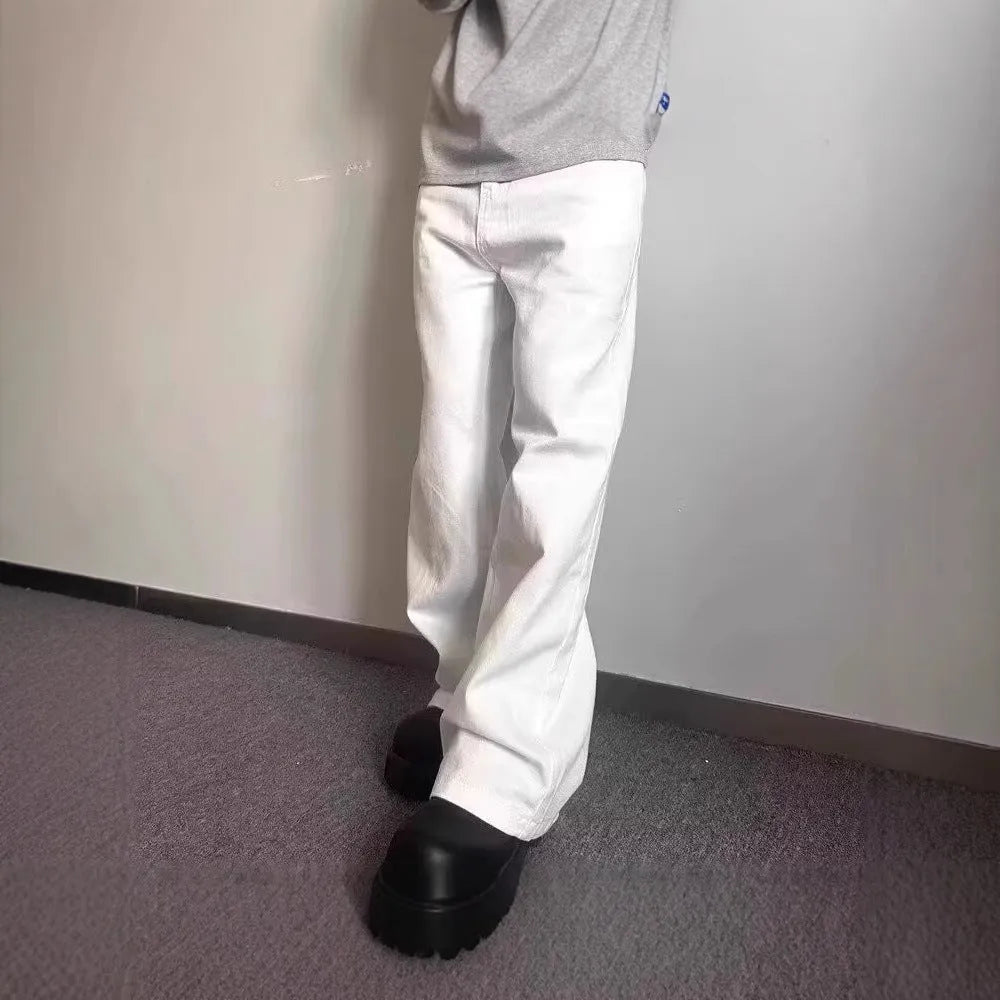 Men's white straight-leg jeans with loose fit and mid-waist cut