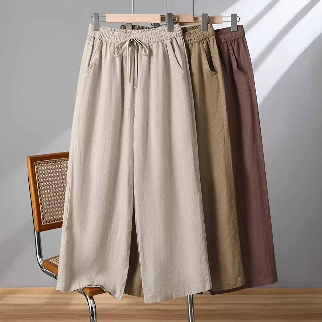 Women's straight-leg casual trousers with elastic waist and drawstring detail in apricot colour