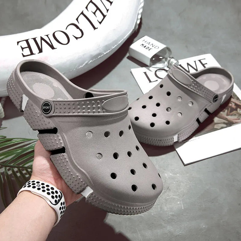Men's non-slip EVA closed toe sandals in black with hollow-out design and height increasing sole.