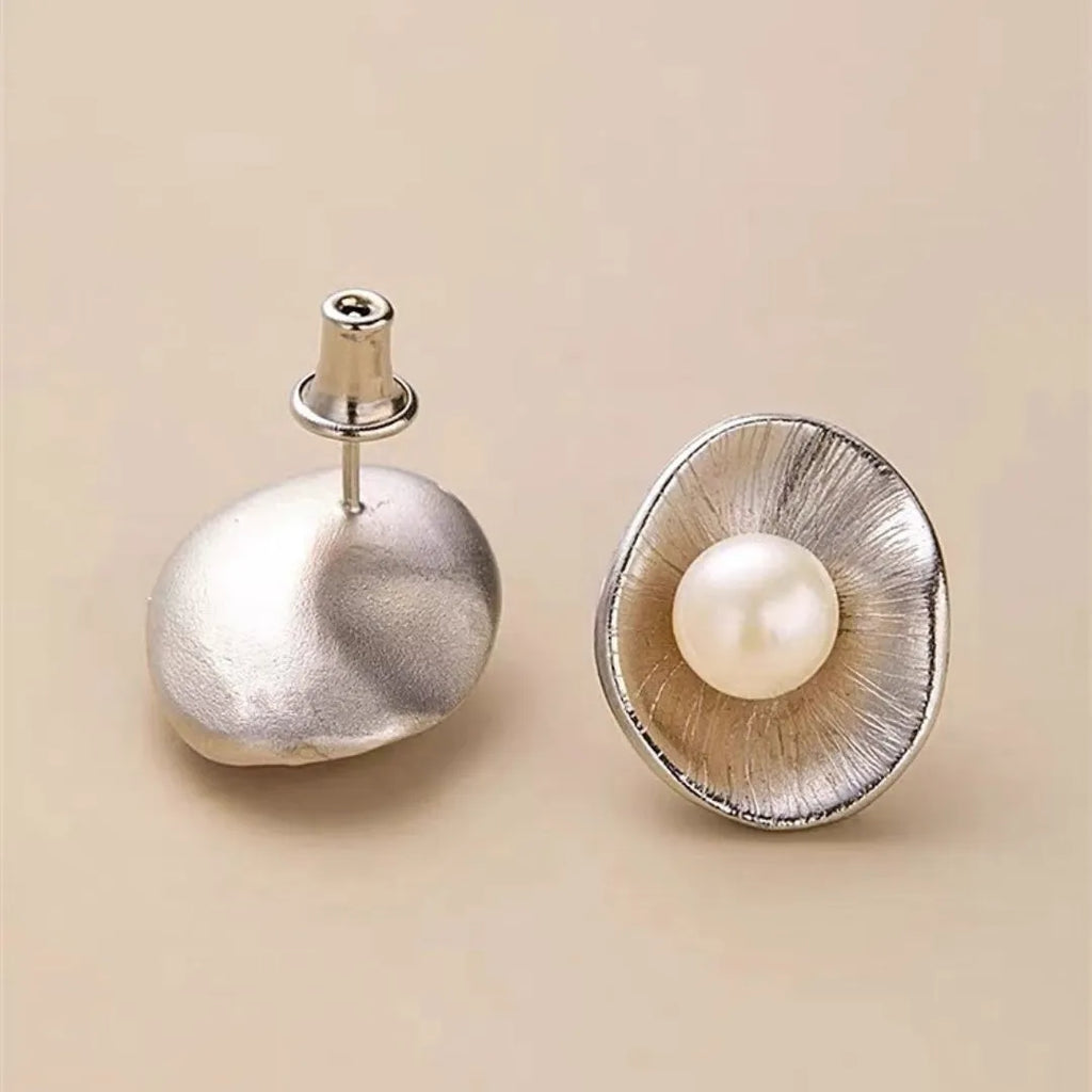 Pearl sterling silver needle earrings with electroplated gold finish and geometry shape design