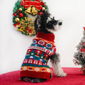 Pet dog wearing a red and green Christmas turtleneck wool sweater, side view