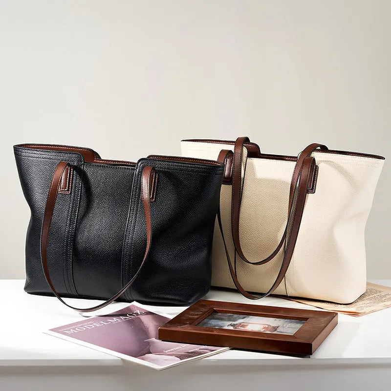 Women's genuine leather crossbody bag with horizontal square design and multiple interior compartments in black colour