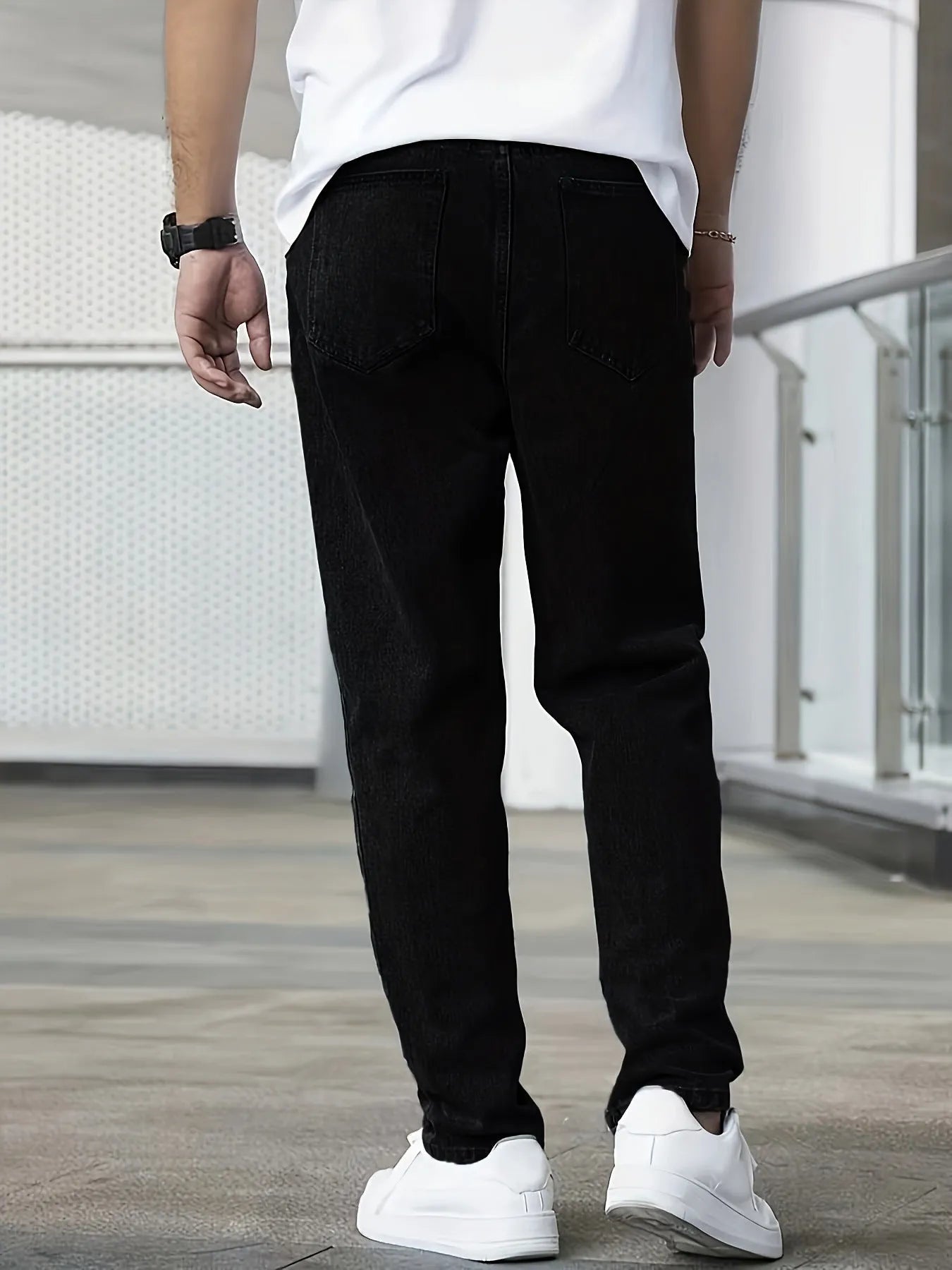 Men's black straight-leg cotton jeans mid-rise zip fly casual trousers front view