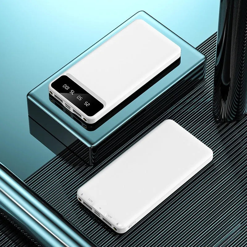 20000 mAh black power bank with charging cable showing compact portable design