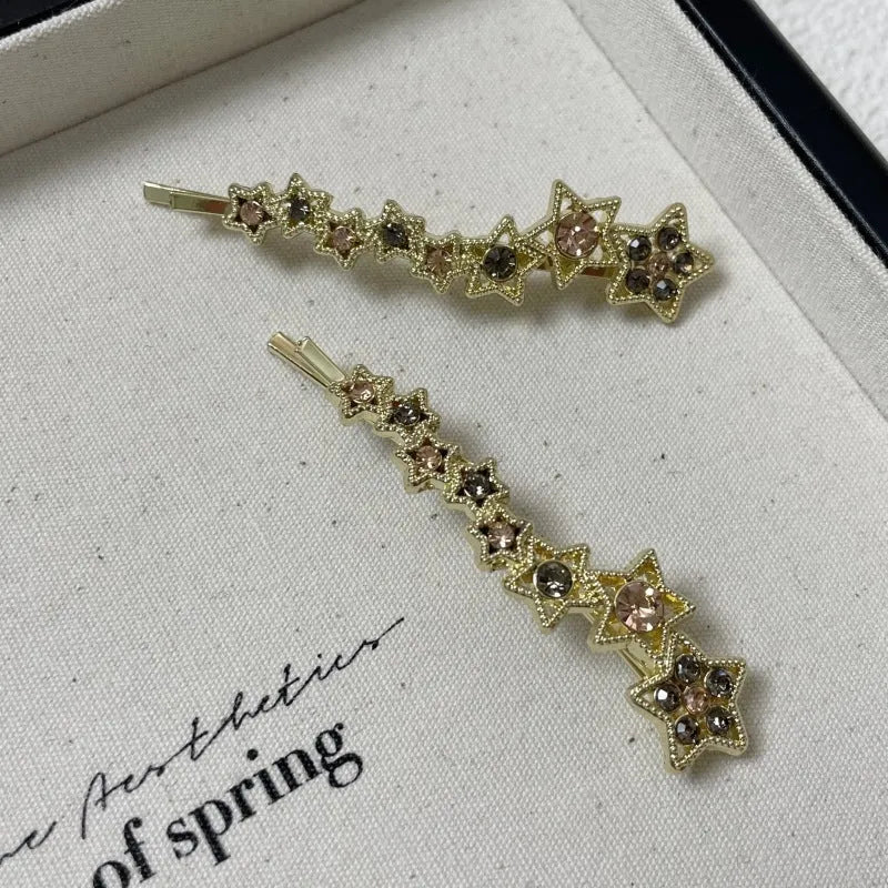Gold electroplated Korean style barrette with five-pointed star rhinestone design for hair