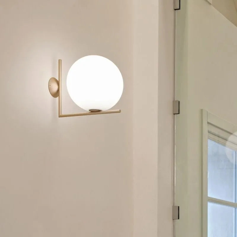 Nordic style glass wall lamp in choice of black, brass or chrome metallic finish