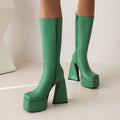 Women's artificial PU leather high boots in black, red, blue, and white colours showing ankle and lower calf coverage