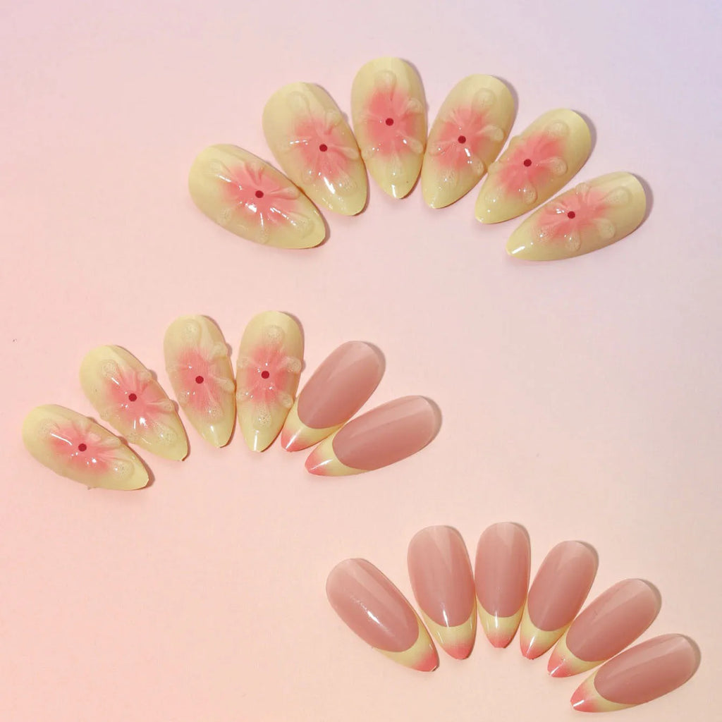 Simple fake nails with 3D cartoon flower designs, plastic wearable armour pieces, jelly glue and filing strip