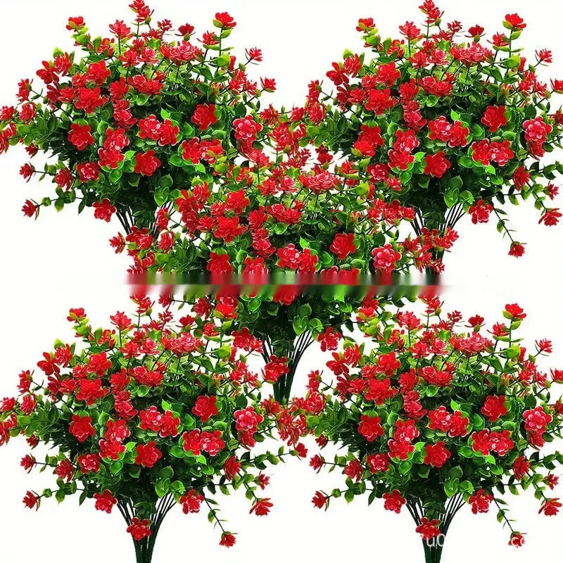 Artificial eucalyptus camellia plastic bouquet in mixed colours on white background