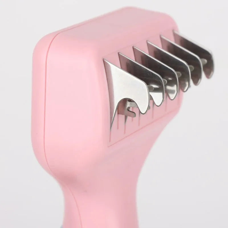 Pink dog comb with stainless steel blade and massage nodules for pet grooming.