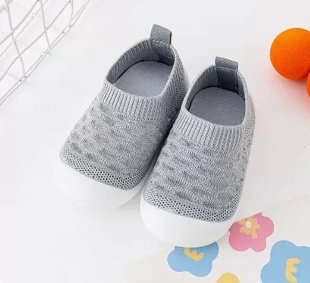 Baby soft sole non-slip walking shoes in fly woven cotton and natural rubber, available in multiple colours and sizes 11.5-15.5cm