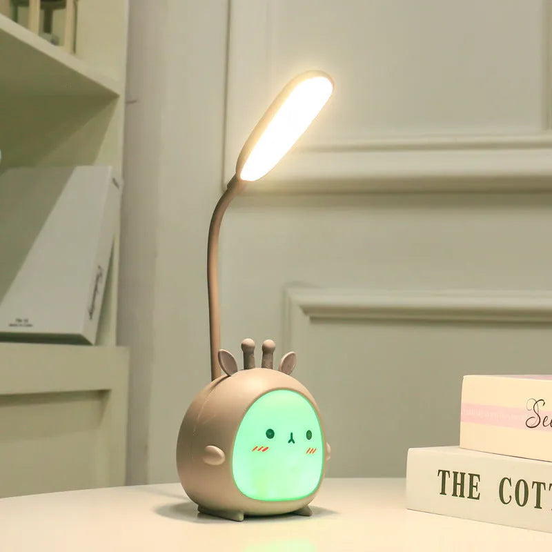 Cartoon deer USB charging folding LED reading lamp with plastic shade on desk