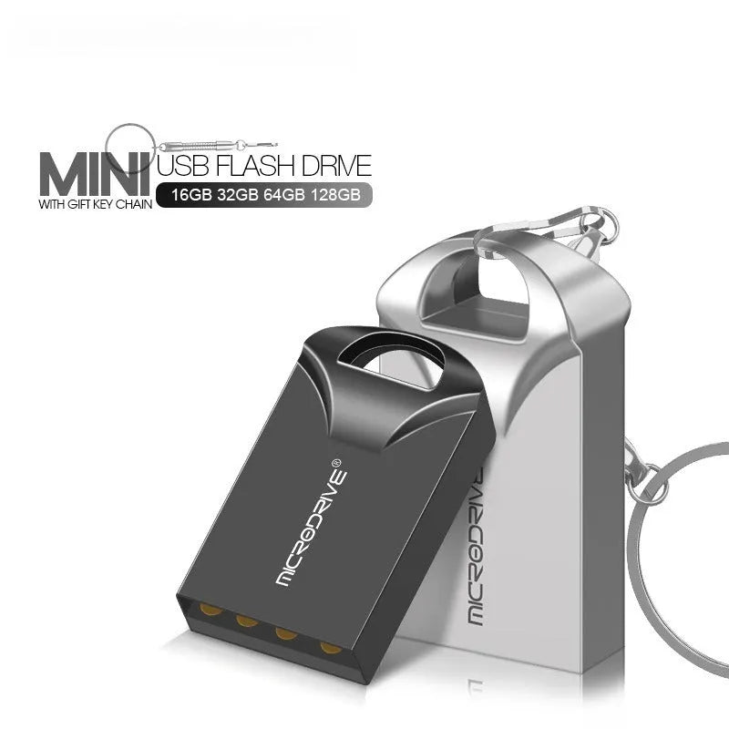 Small black and silver metal USB flash drive showing miniature size