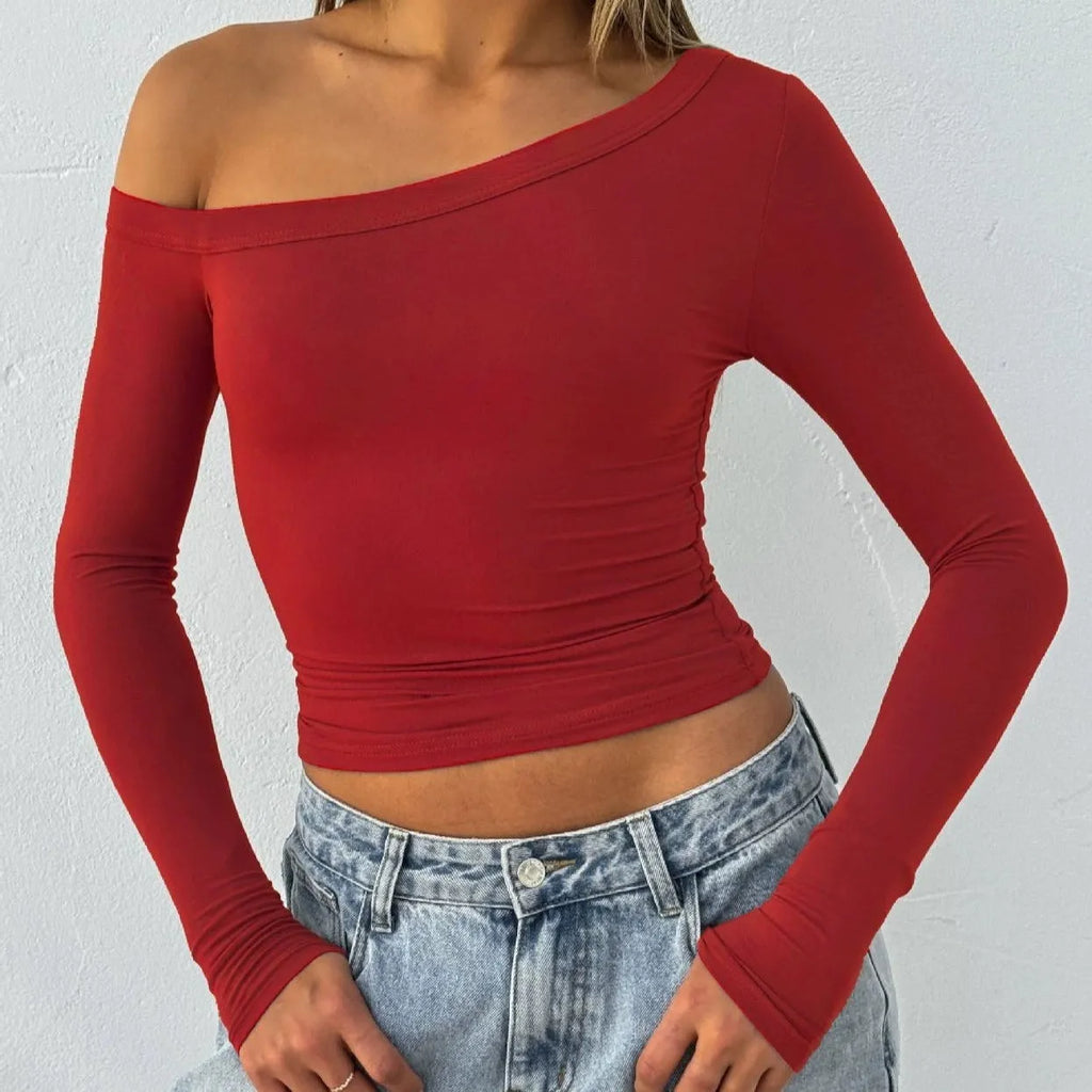 Women's slim fit viscose blend knitted cardigan with long sleeves and cross shoulder straps in solid colour.