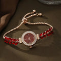Women's round quartz watch with green leaf pattern, diamond accents, and fine metal band
