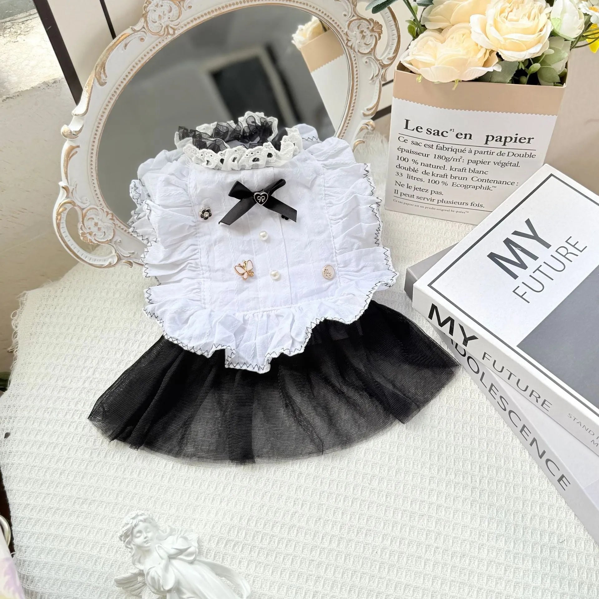 White yarn skirt princess style dog clothing on mannequin showing gauze skirt design