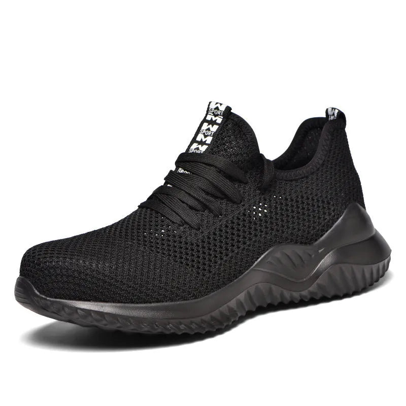Black low-cut safety work shoes with a visible steel toe cap, shown on a grey background.