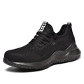 Black low-cut safety work shoes with a visible steel toe cap, shown on a grey background.