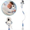 White no-drill baby camera bracket with flexible arm and anti-slip clamp attached to a desk