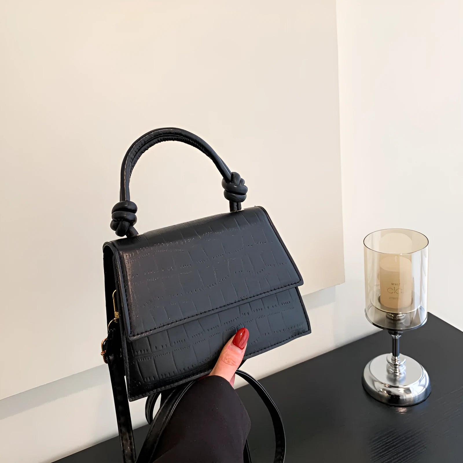 Women's soft PU underarm bag in horizontal rectangle shape with stitched seams and single shoulder strap